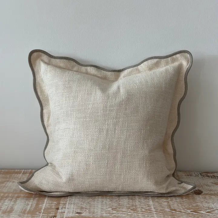 Cream scallop cushion