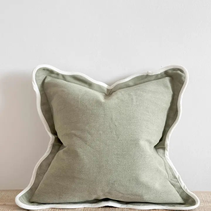 Green scallop edge cushion