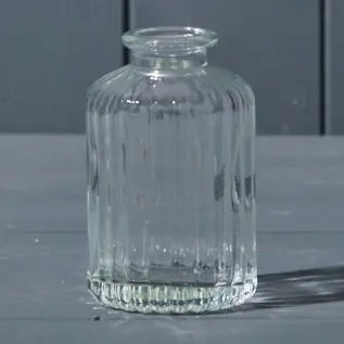 Clear ribbed bottle