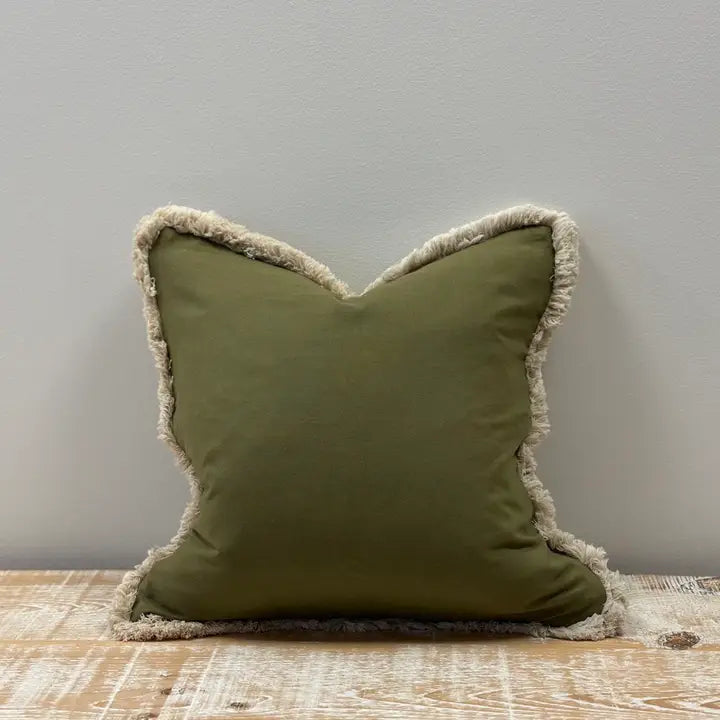 Frill edge green cushion