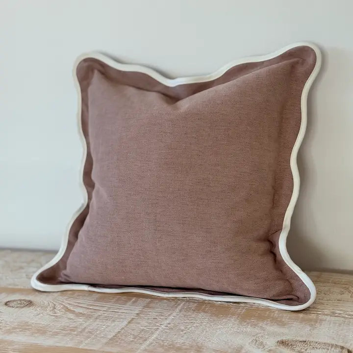 Pink scallop edge cushion